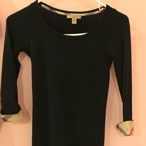 Black Burberry quarter sleeve shirt. Gently worn